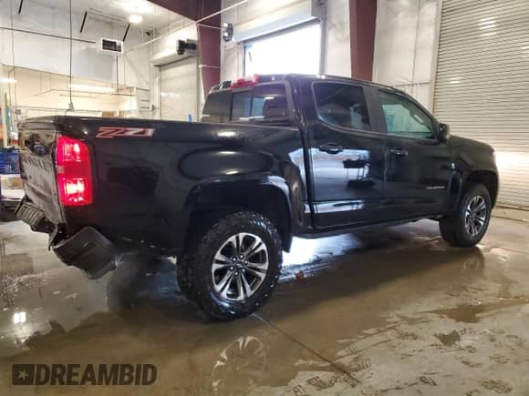 2021 Chevrolet Colorado 4WD Z71 with VIN 1GCGTDEN9M1218648, listed as a Copart auction lot 69701235 with 41,672 mi miles and Salvage title. Bid and sale history available at DreamBid. Image 3.