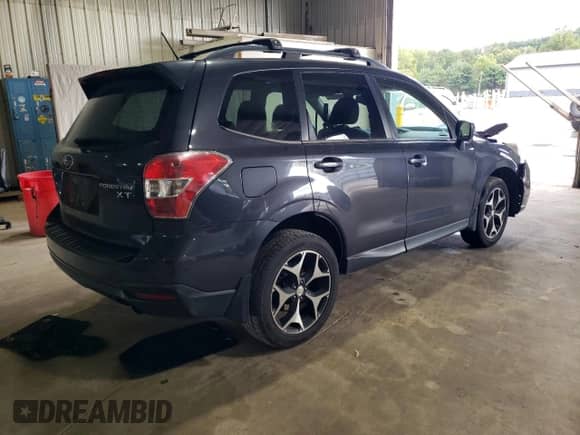 2014 Subaru Forester XT Touring z VIN JF2SJGPCXEH539752, wystawiony jako Copart lot #84366065 z przebiegiem 121 005 mil mil oraz Szkoda całkowita • Salvage title. Historia ofert i sprzedaży dostępna na DreamBid. Obrazek 3.
