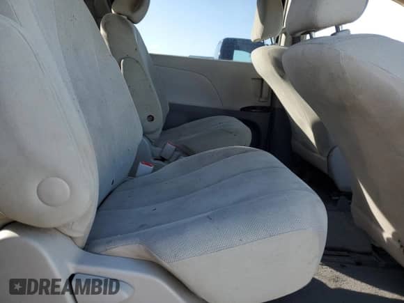2012 Toyota Sienna with VIN 5TDZK3DC3CS210035, listed as a Copart auction lot 83798255 with 319,065 mi miles and Salvage title. Bid and sale history available at DreamBid. Image 11.