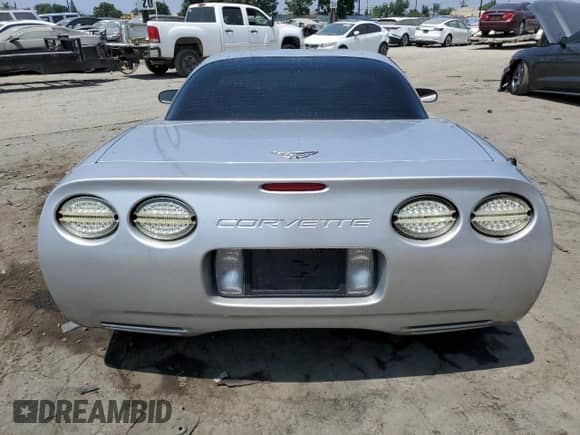 2003 Chevrolet Corvette Z06 z VIN 1G1YY12S935105216, wystawiony jako Copart lot #68721585 z przebiegiem 99 972 mil mil oraz Szkoda całkowita • Salvage title. Historia ofert i sprzedaży dostępna na DreamBid. Obrazek 6.