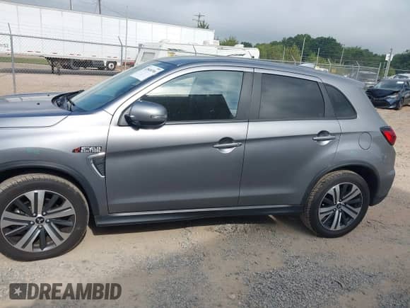 2021 Mitsubishi Outlander ES z VIN JA4ARUAU0MU022933, wystawiony jako IAAI lot #42848396 z przebiegiem 62 789 mil mil oraz . Historia ofert i sprzedaży dostępna na DreamBid. Obrazek 14.
