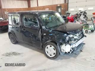 2010 Nissan Cube S Krom Edition with VIN JN8AZ2KR6AT153102, listed as a IAAI auction lot 42958119 with 104,823 mi miles and . Bid and sale history available at DreamBid. Image 1.