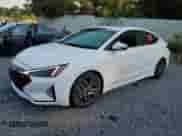 2020 Hyundai Elantra Sport z VIN KMHD04LB0LU979677, wystawiony jako Copart lot #68612155 z przebiegiem 61 149 mil mil oraz Szkoda całkowita • Salvage title. Historia ofert i sprzedaży dostępna na DreamBid. Obrazek 1.