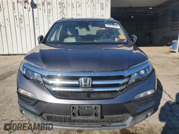 2017 Honda Pilot Touring с VIN 5FNYF6H96HB012321, выставлен на аукционе Copart как лот 85910375 с пробегом 270 102 миль миль и Чистый • Clean title. История ставок и продаж доступна на DreamBid. Изображение 5.