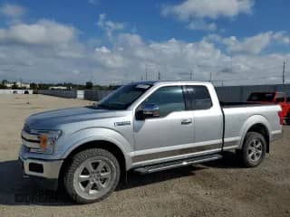 2018 Ford F-150 Lariat z VIN 1FTFX1EGXJFB40976, wystawiony jako Copart lot #83829255 z przebiegiem 50 093 mil mil oraz Szkoda całkowita • Salvage title. Historia ofert i sprzedaży dostępna na DreamBid. Obrazek 1.
