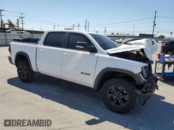 2021 Ram 1500 Rebel z VIN 1C6SRFLT0MN538169, wystawiony jako Copart lot #80576935 z przebiegiem 129 462 mil mil oraz Szkoda całkowita • Salvage title. Historia ofert i sprzedaży dostępna na DreamBid. Obrazek 4.