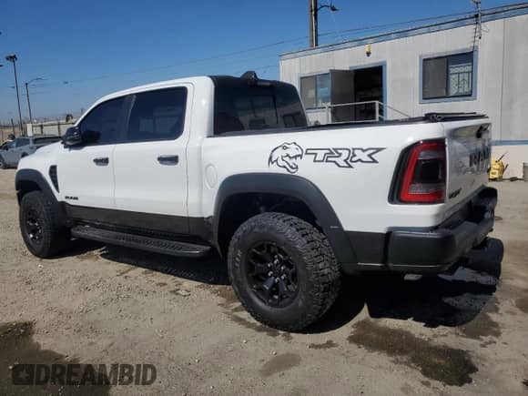 2023 Ram 1500 TRX z VIN 1C6SRFU94PN509541, wystawiony jako Copart lot #81091595 z przebiegiem 25 593 mil mil oraz Szkoda całkowita • Salvage title. Historia ofert i sprzedaży dostępna na DreamBid. Obrazek 2.