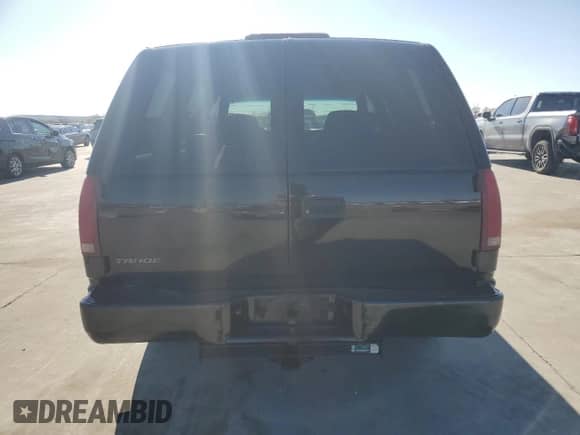 2000 Chevrolet Tahoe Limited с VIN 1GNEC13R4YR141259, выставлен на аукционе Copart как лот 85578904 с пробегом 195 944 миль миль и Списание • Salvage title. История ставок и продаж доступна на DreamBid. Изображение 6.