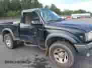 2004 Toyota Tacoma PreRunner z VIN 5TENM92N64Z381902, wystawiony jako IAAI lot #43376084 z przebiegiem 205 372 mil mil oraz . Historia ofert i sprzedaży dostępna na DreamBid. Obrazek 6.