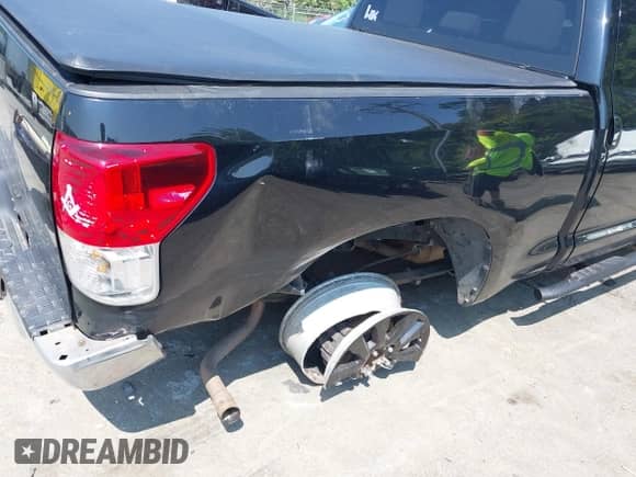2012 Toyota Tundra z VIN 5TFRU5F18CX026186, wystawiony jako IAAI lot #42414319 z przebiegiem 216 128 mil mil oraz . Historia ofert i sprzedaży dostępna na DreamBid. Obrazek 6.
