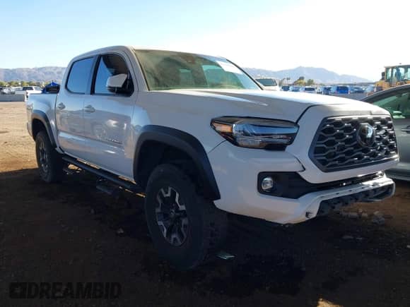 2021 Toyota Tacoma SR5 with VIN 3TMAZ5CN7MM153055, listed as a IAAI auction lot 41350066 with 33,064 mi miles and . Bid and sale history available at DreamBid. Image 1.