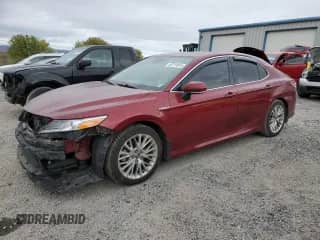 2020 Toyota Camry Hybrid XLE with VIN 4T1F31AK1LU019527, listed as a Copart auction lot 89719815 with 108,771 mi miles and Salvage title. Bid and sale history available at DreamBid. Image 1.