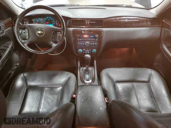 2013 Chevrolet Impala LTZ with VIN 2G1WC5E33D1155274, listed as a Copart auction lot 82623505 with 165,910 mi miles and Salvage title. Bid and sale history available at DreamBid. Image 8.