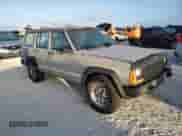 1991 Jeep Grand Cherokee with VIN 1J4FJ88S1ML588369, listed as a Copart auction lot 77368084 with Not provided miles and Salvage title. Bid and sale history available at DreamBid. Image 4.