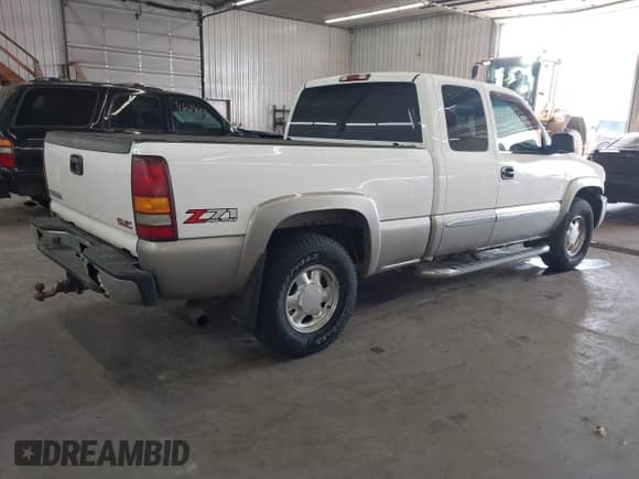 2003 GMC Sierra 1500 SLT with VIN 2GTEK19T431234492, listed as a IAAI auction lot 41790680 with 199,025 mi miles and . Bid and sale history available at DreamBid. Image 4.
