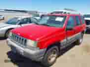 1996 Jeep Grand Cherokee Laredo z VIN 1J4GZ58Y5TC183677, wystawiony jako IAAI lot #42582989 z przebiegiem 187 453 mil mil oraz . Historia ofert i sprzedaży dostępna na DreamBid. Obrazek 2.