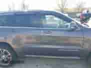 2014 Jeep Grand Cherokee SRT-8 z VIN 1C4RJFDJXEC390248, wystawiony jako IAAI lot #41794995 z przebiegiem 87 881 mil mil oraz . Historia ofert i sprzedaży dostępna na DreamBid. Obrazek 14.