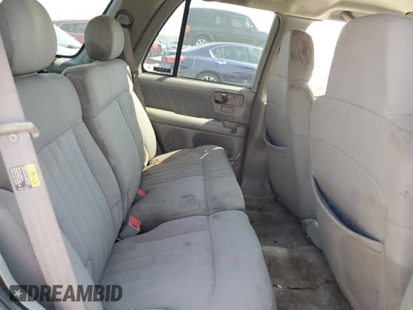 2003 Chevrolet Blazer LS с VIN 1GNCS13X43K162199, выставлен на аукционе Copart как лот 49215295 с пробегом Не указан миль и Списание • Salvage title. История ставок и продаж доступна на DreamBid. Изображение 11.