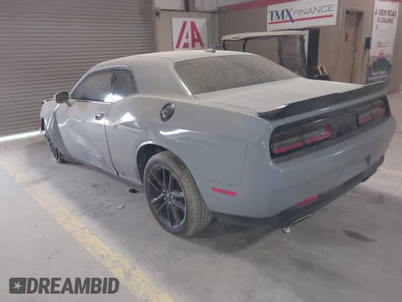 2021 Dodge Challenger GT z VIN 2C3CDZKG6MH642079, wystawiony jako IAAI lot #41612713 z przebiegiem 76 863 mil mil oraz . Historia ofert i sprzedaży dostępna na DreamBid. Obrazek 3.