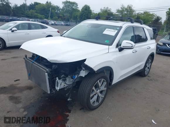 2021 Hyundai Palisade SEL z VIN KM8R3DHE3MU266824, wystawiony jako IAAI lot #42912329 z przebiegiem 55 005 mil mil oraz . Historia ofert i sprzedaży dostępna na DreamBid. Obrazek 2.