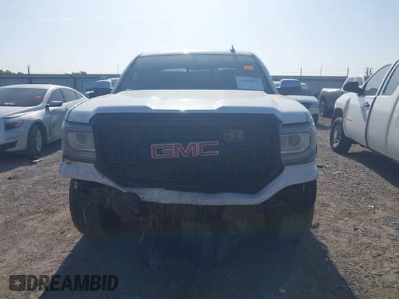 2018 GMC Sierra 1500 SLT with VIN 3GTU2NEC4JG601288, listed as a IAAI auction lot 42686096 with 140,289 mi miles and . Bid and sale history available at DreamBid. Image 12.