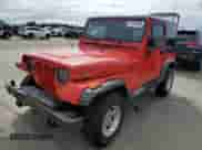 1992 Jeep Wrangler with VIN 2J4FY29S3NJ535736, listed as a Copart auction lot 67747244 with 144,912 mi miles and Salvage title. Bid and sale history available at DreamBid. Image 1.