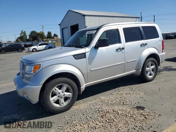 2011 Dodge Nitro SXT with VIN 1D4PU5GKXBW579119, listed as a Copart auction lot 84003925 with 185,345 mi miles and Salvage title. Bid and sale history available at DreamBid. Image 1.