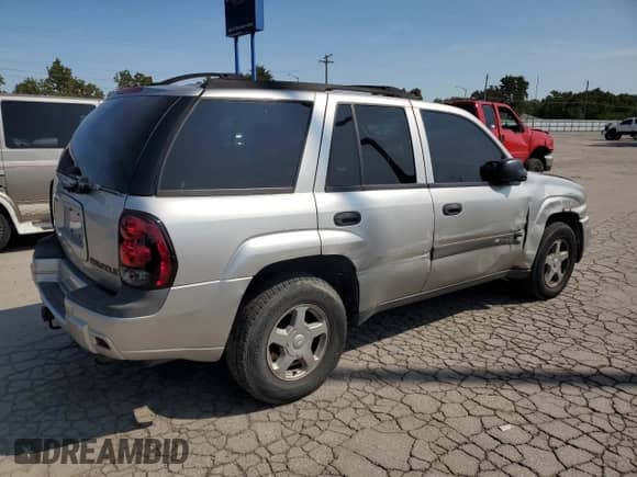 2004 Chevrolet TrailBlazer LS с VIN 1GNDT13S142324054, выставлен на аукционе Copart как лот 71611385 с пробегом 241 439 миль миль и Списание • Salvage title. История ставок и продаж доступна на DreamBid. Изображение 3.