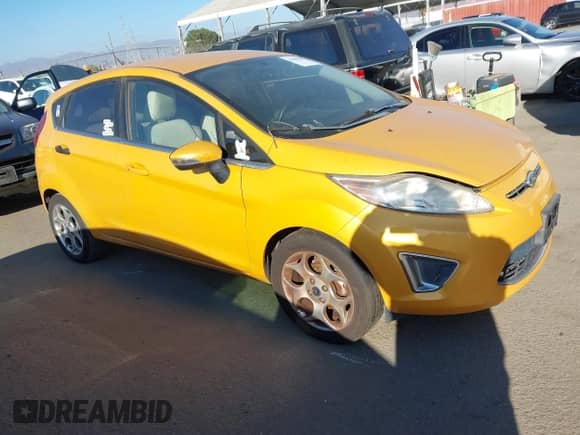2011 Ford Fiesta SES with VIN 3FADP4FJ8BM127606, listed as a IAAI auction lot 43409509 with 167,457 mi miles and . Bid and sale history available at DreamBid. Image 1.