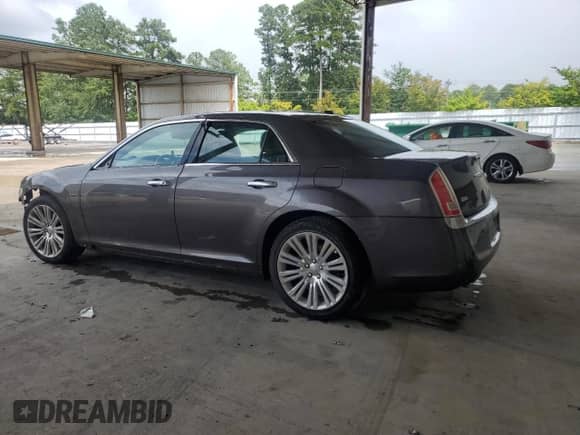 2014 Chrysler 300 C John Varvatos Luxury Edition с VIN 2C3CCADG3EH125888, выставлен на аукционе Copart как лот 68345205 с пробегом 139 104 миль миль и Списание • Salvage title. История ставок и продаж доступна на DreamBid. Изображение 2.