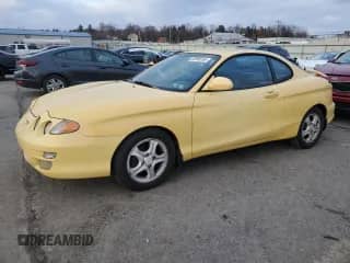 2001 Hyundai Tiburon с VIN KMHJG35F01U231789, выставлен на аукционе Copart как лот 88988265 с пробегом 106 946 миль миль и Чистый • Clean title. История ставок и продаж доступна на DreamBid. Изображение 1.