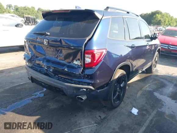 2021 Honda Passport Elite с VIN 5FNYF8H01MB013352, выставлен на аукционе IAAI как лот 42786380 с пробегом 56 503 миль миль и . История ставок и продаж доступна на DreamBid. Изображение 4.