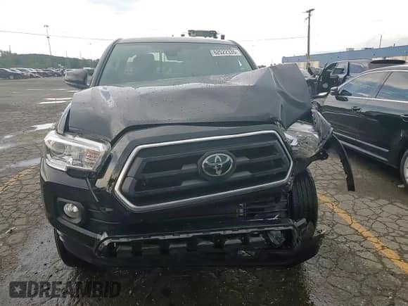 2022 Toyota Tacoma SR z VIN 3TYSZ5AN0NT077417, wystawiony jako Copart lot #62022335 z przebiegiem 9 254 mil mil oraz Nie do naprawy • Non repairable. Historia ofert i sprzedaży dostępna na DreamBid. Obrazek 13.