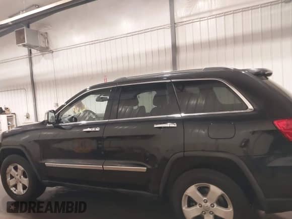 2011 Jeep Grand Cherokee 70th Anniversary с VIN 1J4RR4GG3BC680723, выставлен на аукционе IAAI как лот 41748828 с пробегом 166 480 миль миль и . История ставок и продаж доступна на DreamBid. Изображение 15.