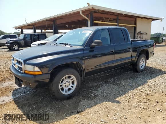 2004 Dodge Dakota Sport with VIN 1D7HL38K54S520454, listed as a Copart auction lot 64086085 with 225,994 mi miles and Salvage title. Bid and sale history available at DreamBid. Image 1.