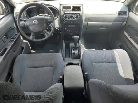 2003 Nissan Frontier XE with VIN 1N6ED29X03C466209, listed as a Copart auction lot 63758945 with 211,744 mi miles and Salvage title. Bid and sale history available at DreamBid. Image 8.