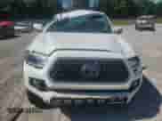 2019 Toyota Tacoma TRD Off Road z VIN 3TMCZ5AN9KM282522, wystawiony jako Copart lot #85939905 z przebiegiem 89 447 mil mil oraz Nie do naprawy • Non repairable. Historia ofert i sprzedaży dostępna na DreamBid. Obrazek 5.