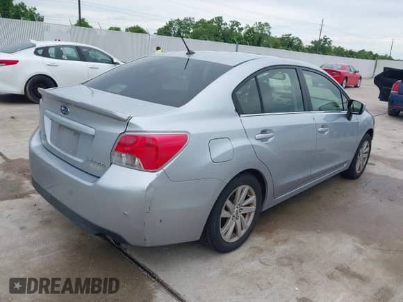 2015 Subaru Impreza Premium with VIN JF1GJAC62FH018713, listed as a IAAI auction lot 42482858 with 81,991 mi miles and . Bid and sale history available at DreamBid. Image 4.