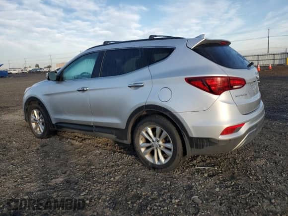 2018 Hyundai Santa Fe 2.0T с VIN 5XYZUDLA1JG563156, выставлен на аукционе Copart как лот 87311935 с пробегом 91 063 миль миль и Чистый • Clean title. История ставок и продаж доступна на DreamBid. Изображение 2.