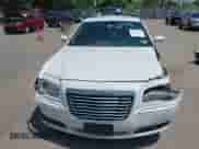 2014 Chrysler 300 z VIN 2C3CCARG8EH201274, wystawiony jako IAAI lot #42227142 z przebiegiem 151 514 mil mil oraz . Historia ofert i sprzedaży dostępna na DreamBid. Obrazek 12.