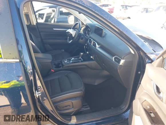 2025 Mazda CX-5 S Preferred with VIN JM3KFBCLXS0671940, listed as a IAAI auction lot 43137879 with 3,151 mi miles and . Bid and sale history available at DreamBid. Image 5.