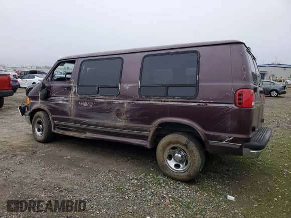 1998 Dodge Cargo Conversion with VIN 2B6HB11Y0WK115037, listed as a Copart auction lot 85734654 with 142,861 mi miles and Non repairable. Bid and sale history available at DreamBid. Image 2.