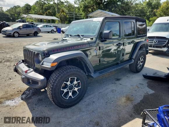2021 Jeep Wrangler Unlimited Rubicon with VIN 1C4HJXFN0MW628283, listed as a Copart auction lot 62825015 with 74,782 mi miles and Salvage title. Bid and sale history available at DreamBid. Image 1.