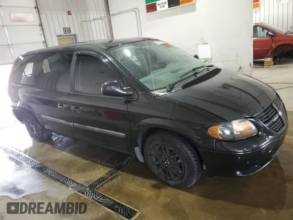 2007 Dodge Caravan SE with VIN 1D8GP24R97B242817, listed as a Copart auction lot 66479355 with 198,079 mi miles and Salvage title. Bid and sale history available at DreamBid. Image 4.