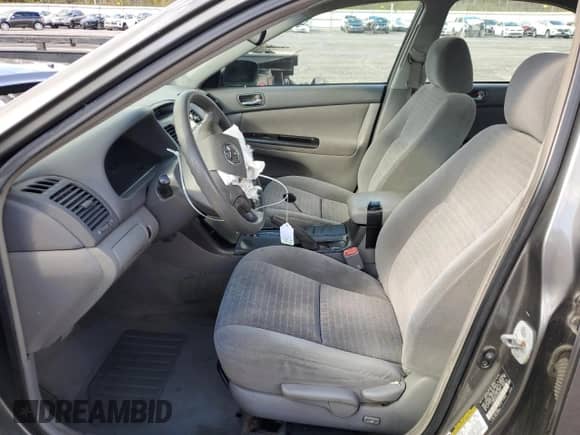 2005 Toyota Camry LE with VIN 4T1BE32K05U556010, listed as a Copart auction lot 82381835 with 210,797 mi miles and Salvage title. Bid and sale history available at DreamBid. Image 7.
