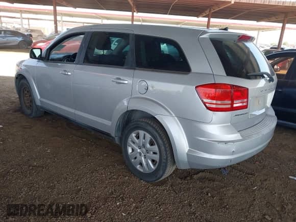 2014 Dodge Journey American Value with VIN 3C4PDCABXET285286, listed as a IAAI auction lot 42944902 with 169,650 mi miles and . Bid and sale history available at DreamBid. Image 3.