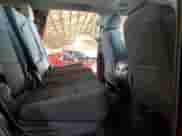 2018 Chevrolet Tahoe LS z VIN 1GNSCAKC7JR388409, wystawiony jako Copart lot #86323815 z przebiegiem 67 959 mil mil oraz Szkoda całkowita • Salvage title. Historia ofert i sprzedaży dostępna na DreamBid. Obrazek 11.