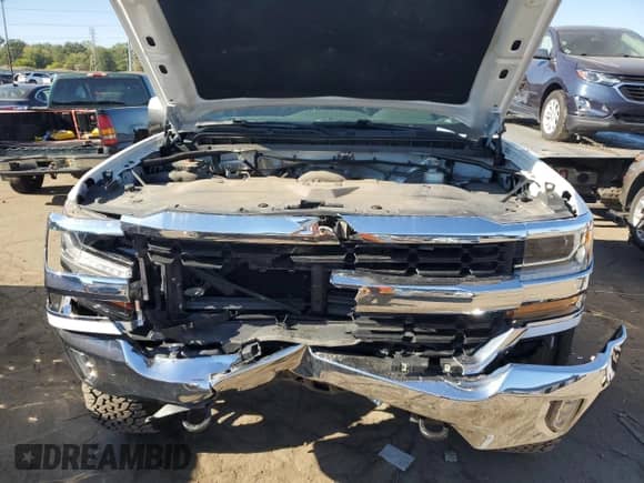 2018 Chevrolet Silverado 1500 LT z VIN 3GCUKRECXJG404231, wystawiony jako Copart lot #84013935 z przebiegiem 89 839 mil mil oraz Czysty tytuł • Clean title. Historia ofert i sprzedaży dostępna na DreamBid. Obrazek 11.