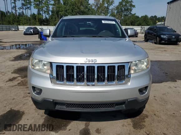 2011 Jeep Grand Cherokee 70th Anniversary z VIN 1J4RR4GG0BC508200, wystawiony jako Copart lot #80286225 z przebiegiem 219 332 mil mil oraz Szkoda całkowita • Salvage title. Historia ofert i sprzedaży dostępna na DreamBid. Obrazek 5.