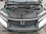 2020 Honda Passport Touring with VIN 5FNYF7H93LB002621, listed as a Copart auction lot 64242965 with 46,711 mi miles and Salvage title. Bid and sale history available at DreamBid. Image 12.